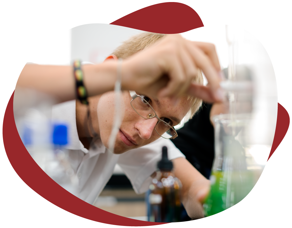 Boy working on Chemistry Experiment